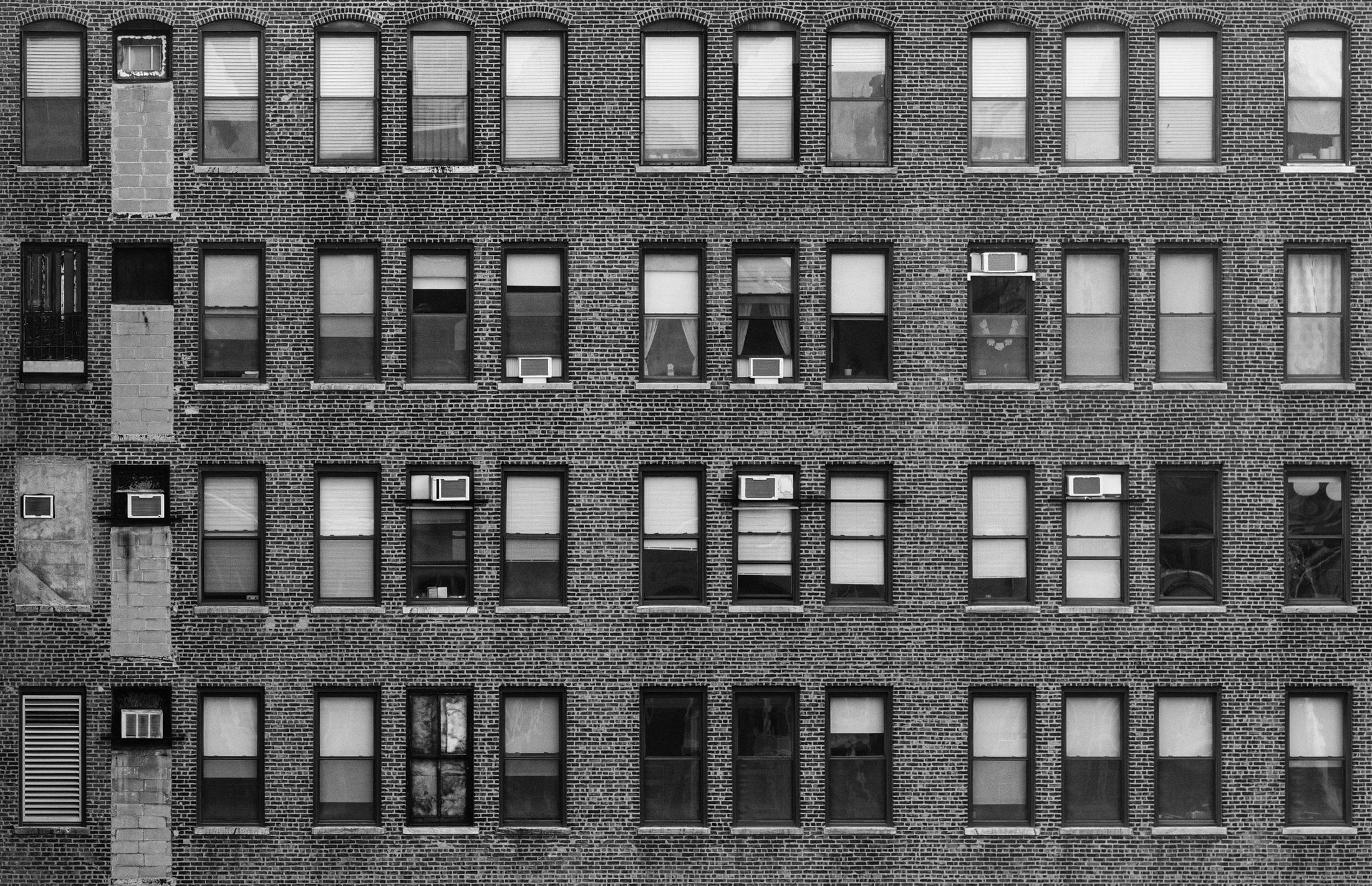 Rows of windows on a brick building in New York City
